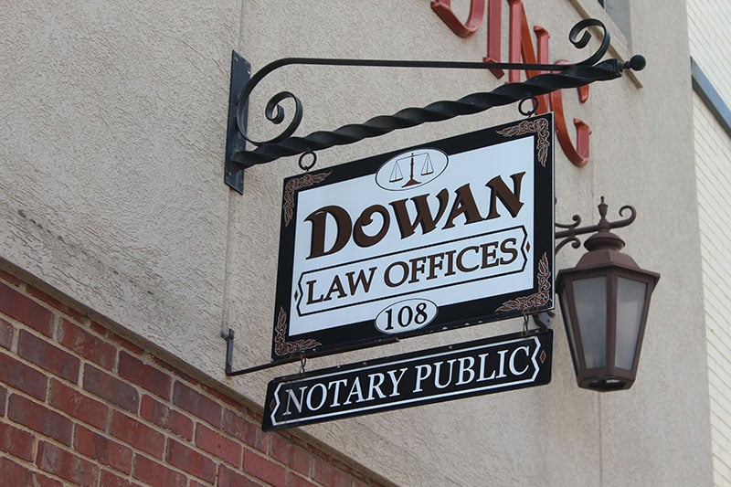 Photo of the Dowan Law Offices sign outside the firm building